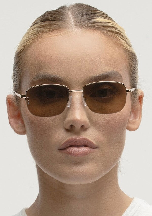 Small rectangular gold sunglasses for women - Otra Eyewear